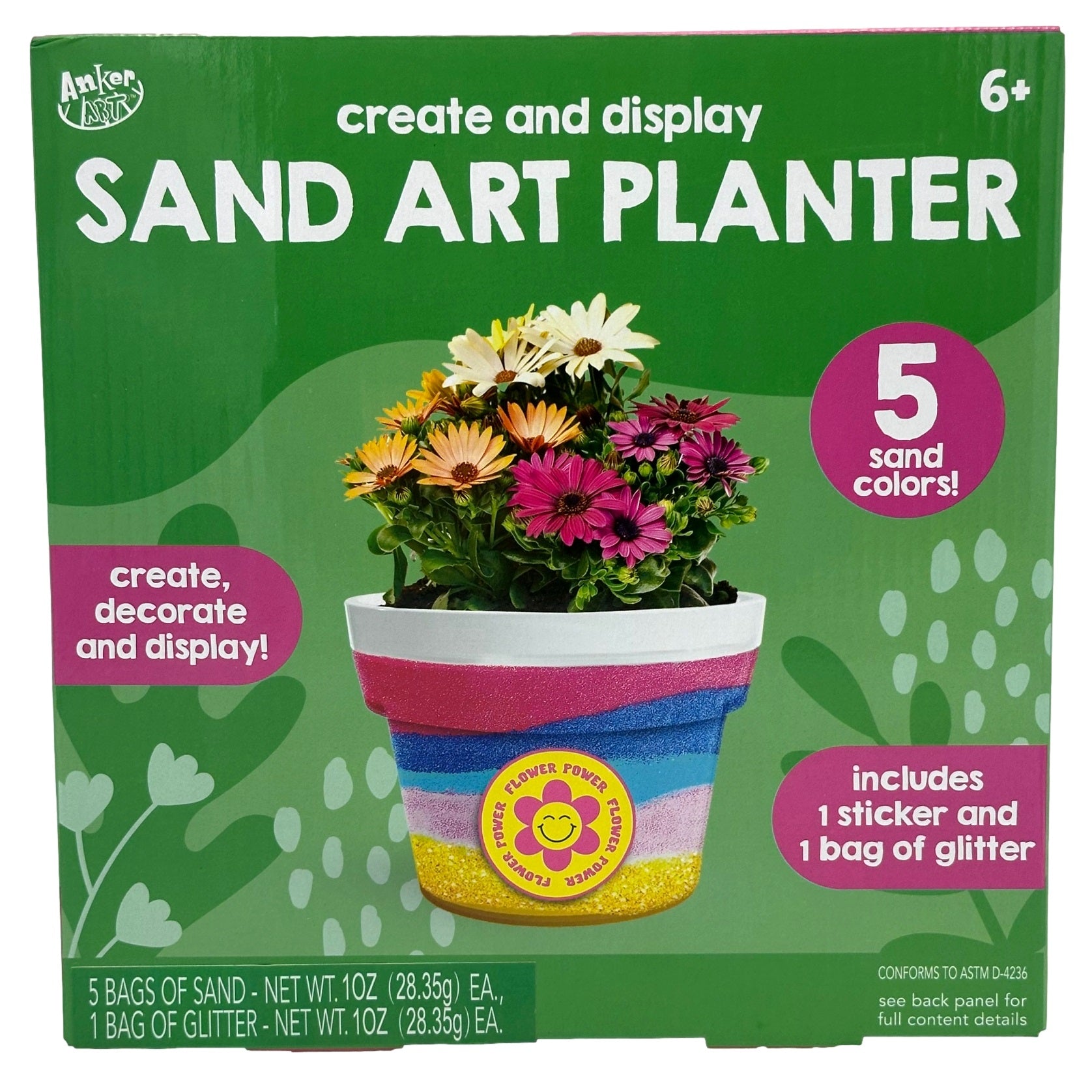 Box of a sand art planter kit with the image of a flower pot with flowers on it, and information about the contents.